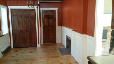 Dining area with fireplace.