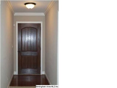 Entry foyer with hardwood floor