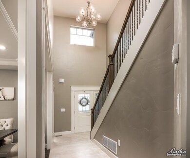 Front Entry View w High Ceiling PHOTO SI