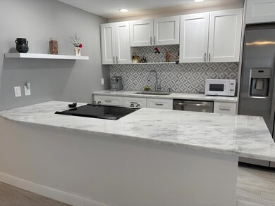 2084 Exeter E unit 2084 E, Boca Raton, FL 33434 - photo 2