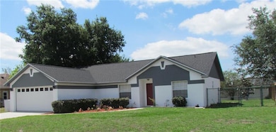 A different angle shows nice sized, fenced yard th