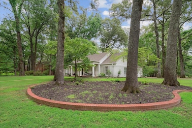View of home's exterior with a lawn