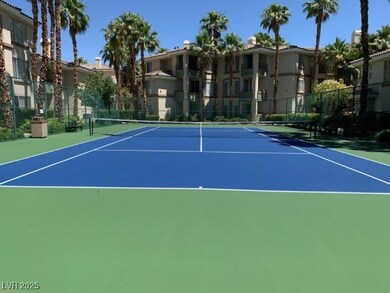 View of tennis court with fence