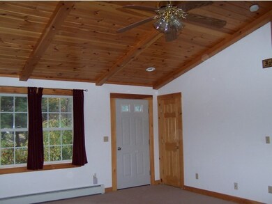 Dining area with hardwood fl