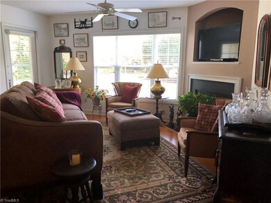 Living room with door to left going to patio.  Lots of natural light!