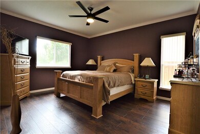 Master Bedroom with new Laminate wood floor.