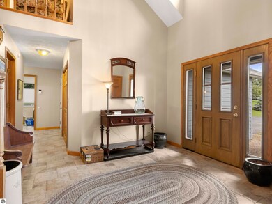 Beautiful and bright foyer entrance with ceramic t