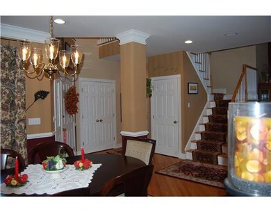 Entry. Gracious foyer open to dining room and livi