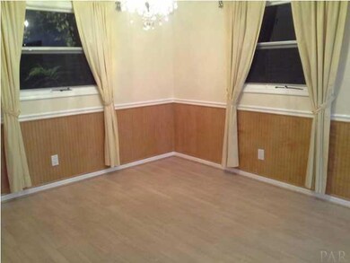 Formal Dining area with wainscot and chair rail