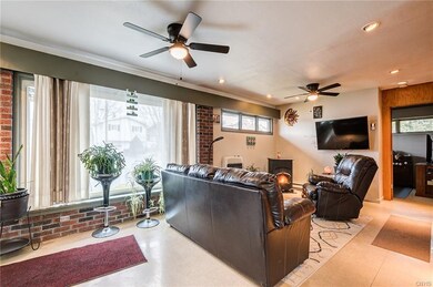 View of living room, notice the exposed brick arou