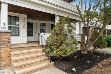 Doorway to property featuring a porch