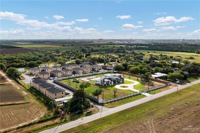 Aerial view of sparsely populated area with nearby suburban area
