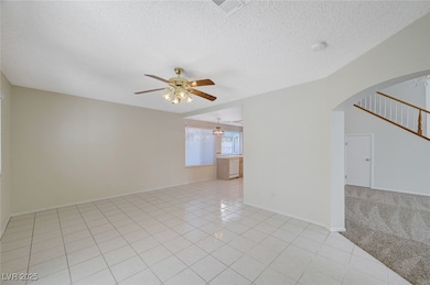 Family room view towards the kitchen on left and living room to the right