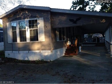 carport with raised porch