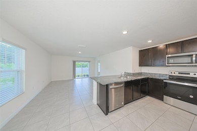 12136 Lily Magnolia Ln, Riverview, FL 33569 - photo 4