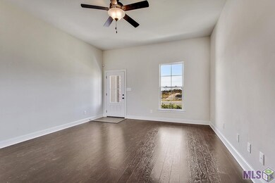 Open living, dining and kitchen.