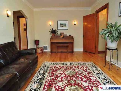 Beautiful Hardwood floor complements the warm walls
