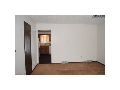 View of living room to the kitchen