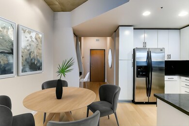 Dining room with light wood-style flooring