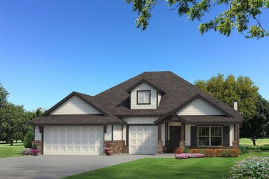 View of front of house with an attached garage, co