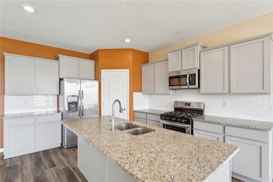 Another view of your sun-filled kitchen