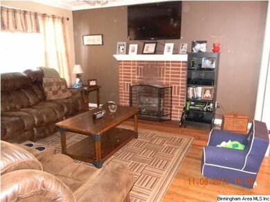 Lovely living room with gorgeous flooring!