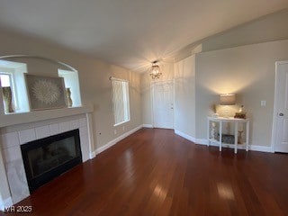 living room with wood  floorsfireplace, fireplace