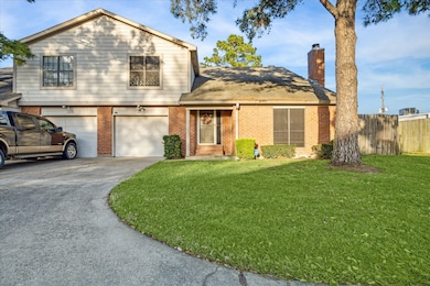 This charming home features a one-car garage and a