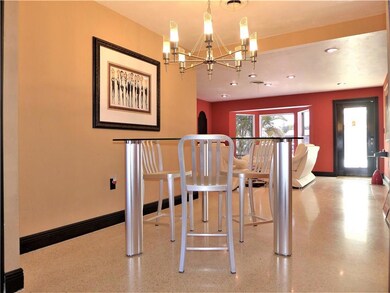 Open concept dinning room lis off the side of the