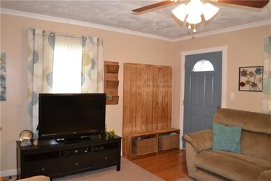 Welcoming entry way into living room.