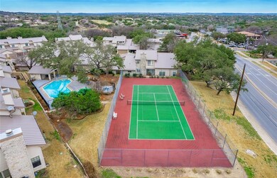 Aerial view of residential area with a pool