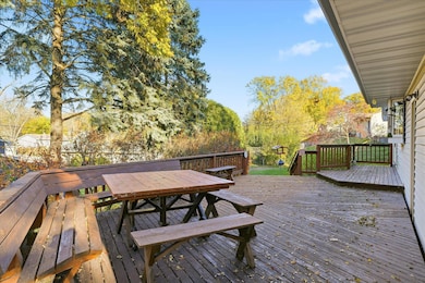 Rear deck 35 x 14 with seating and a custom picnic table & benchs (Included with the sale).