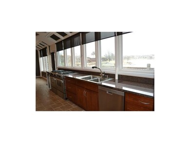 Updated appliances, custom cabinets, quiet close d