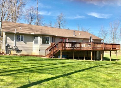 Enjoy the view of the wooded back yard from this m