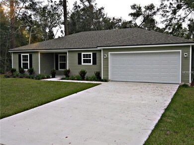 EASY CARE KAYCAN SIDING AND MATURE LANDSCAPE EXTERIOR