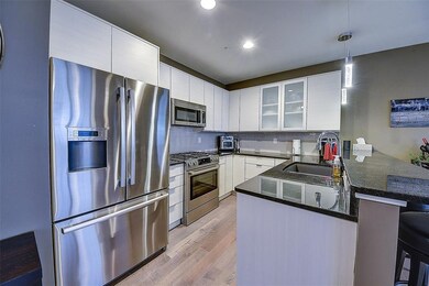 Kitchen with granite counter tops and Bosch applia