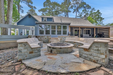 Built-in Firepit. Outdoor firepit with seating area, perfect for evening gatherings and entertaining.