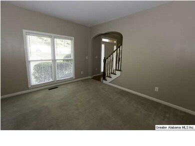 Formal Living Room/Parlor with Arched Doorway woul