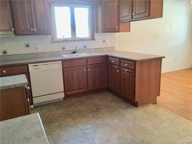 Oak cabinets in remodeled kitchen - open floor pla
