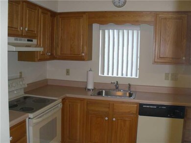 Kitchen. Eat in kitchen with nice cabinets.