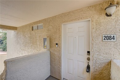 Doorway to property with stucco siding