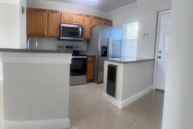 2106 S Cypress Bend Dr unit 404, Pompano Beach, FL 33069 - photo 2
