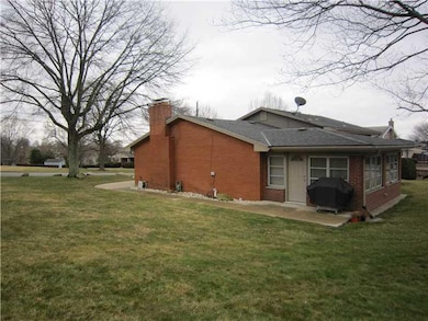 Exterior Back. Family Room/ Sun Room in the back o