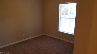 1219 Howell St E, Lehigh Acres, FL 33974 - photo 2