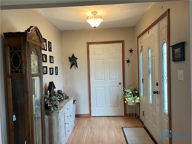 Entry way with closet for all those coats and shoe