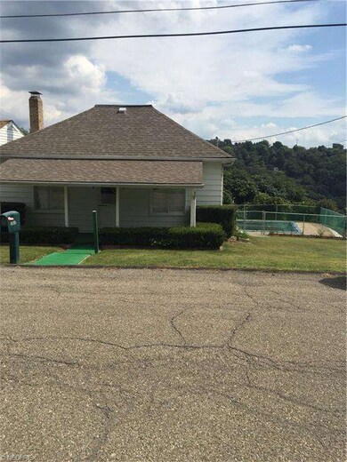 In-ground pool in back yard.