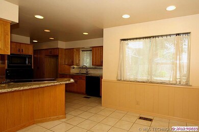 A view of the breakfast bar and kitchen nook area.