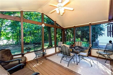 Relaxing 3 Season Screened in Porch overlooks the 