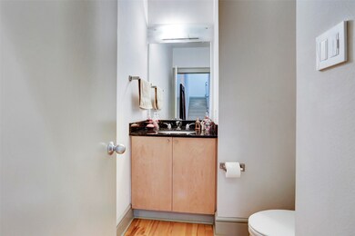 Guest bathroom near living room area.