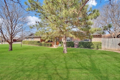 View of yard featuring privacy fenced backyard